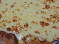 ウルトラチーズ 1KG@ドミノ・ピザ 柔らかチーズ